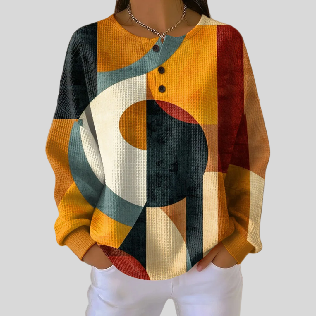 Relaxed-fit waffle knit sweatshirt with retro geometric print in amber, teal, cream and deep red