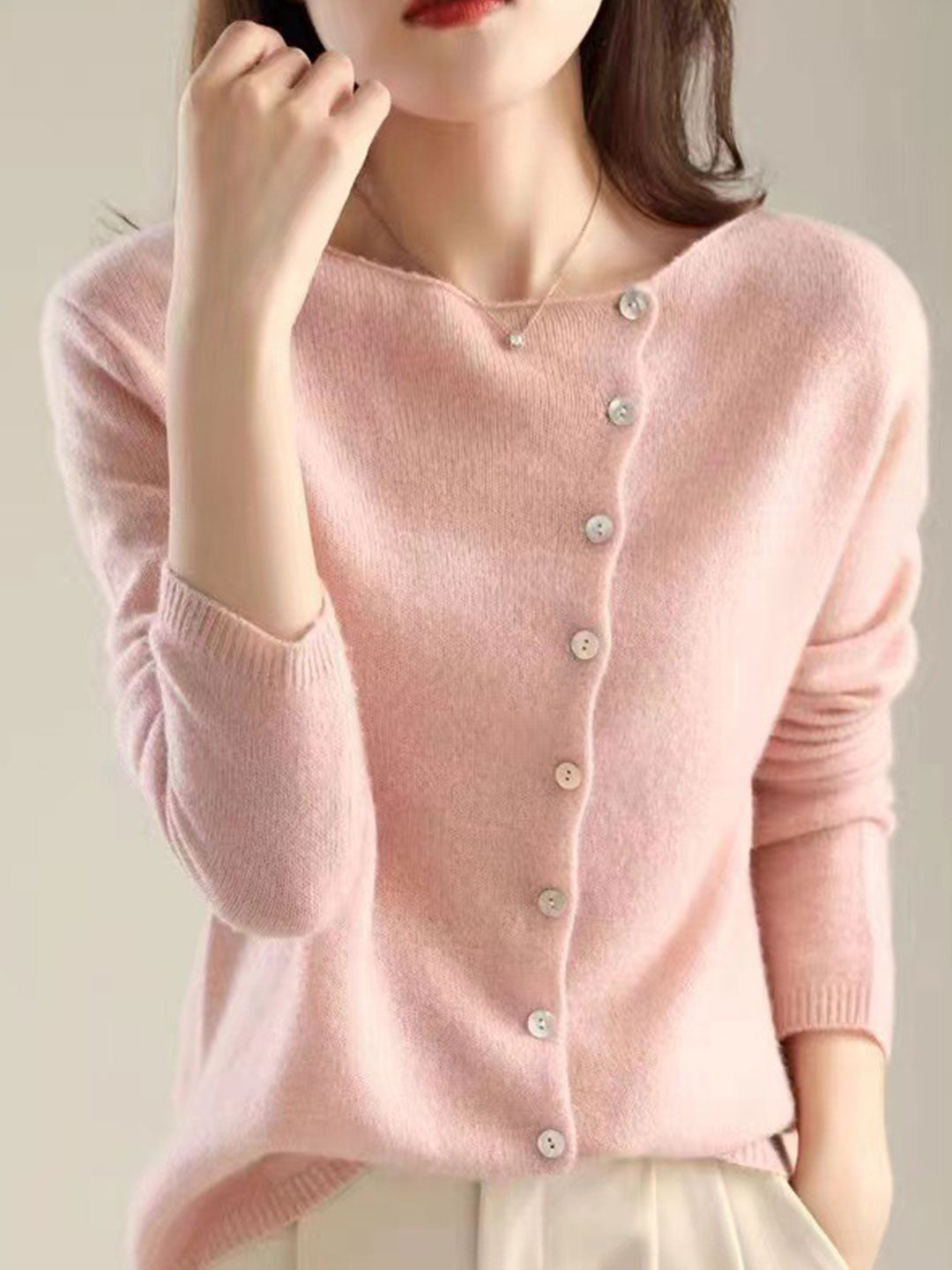 Women's V-neck button-front long sleeve cardigan with softly shaped collar and hip-length hem