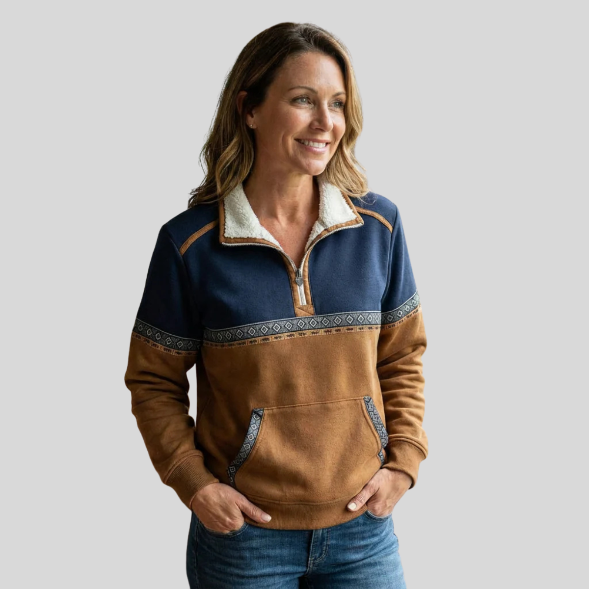 Navy and caramel color-block half-zip pullover with sherpa collar and geometric chest trim