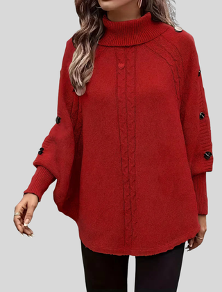 High-neck cable-knit sweater with ribbed turtleneck, shoulder buttons and relaxed oversized fit