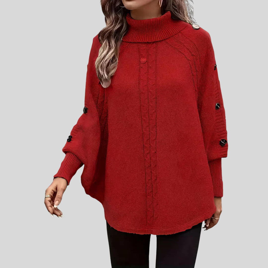 High-neck cable-knit sweater with ribbed turtleneck, shoulder buttons and relaxed oversized fit