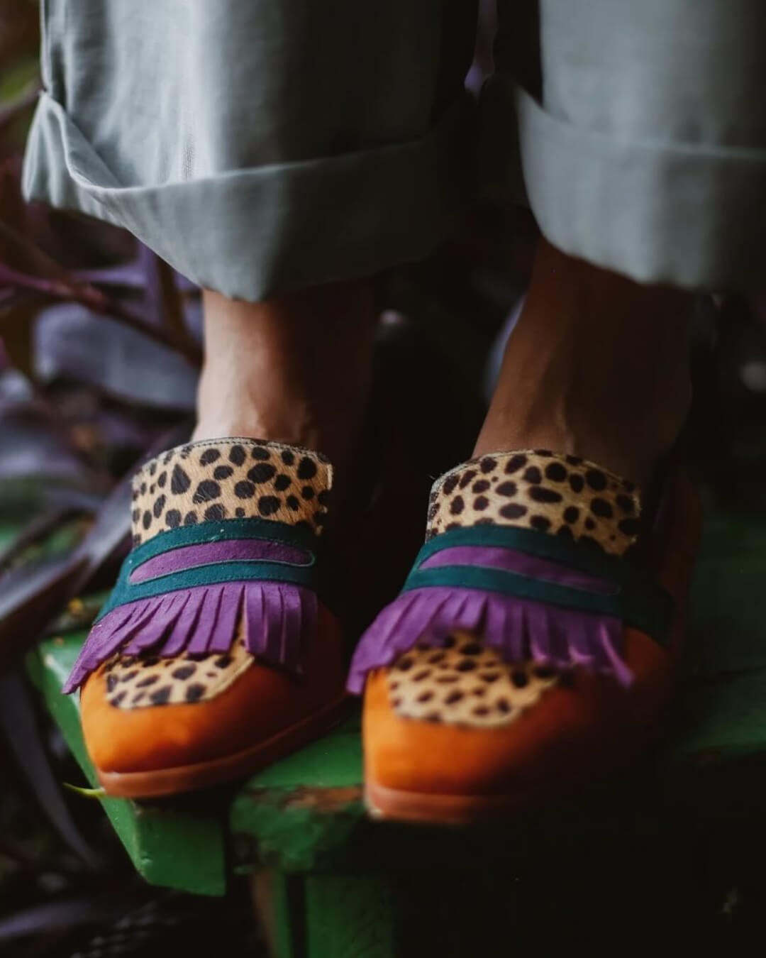 Brown animal print loafers with decorative fringes for women