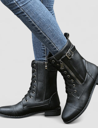 Buckled mid-calf combat boots with lace-up front and low block heel in brown, black and grey
