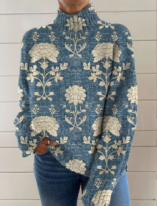 Blue floral turtleneck knit sweater with ribbed cuffs and relaxed fit