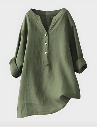 Woman wearing a relaxed cotton-linen V-neck blouse with soft draping