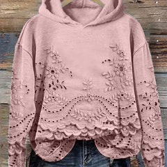 Women's floral eyelet pullover hoodie with structured hood and scalloped hem