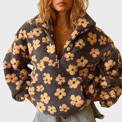 Women's floral quarter-zip sweater with stand collar and gathered cuffs in a relaxed fit