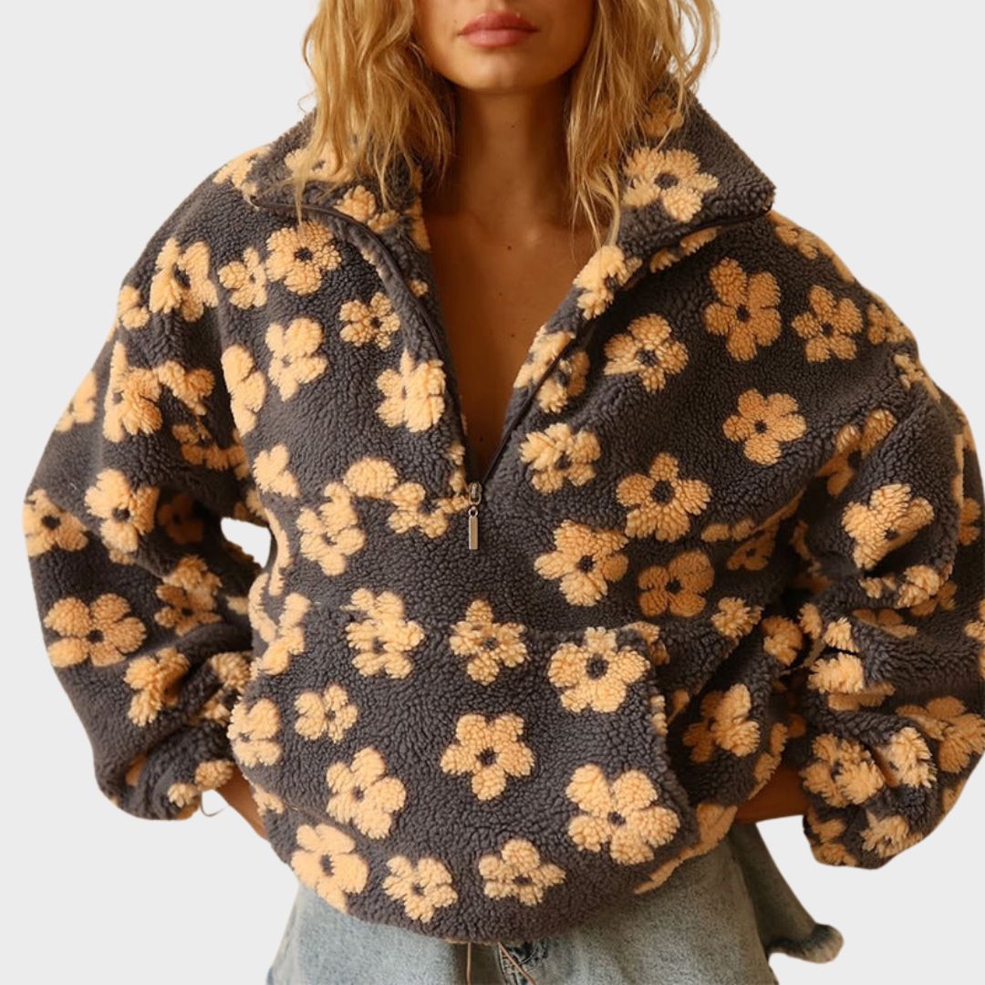 Women's floral quarter-zip sweater with stand collar and gathered cuffs in a relaxed fit