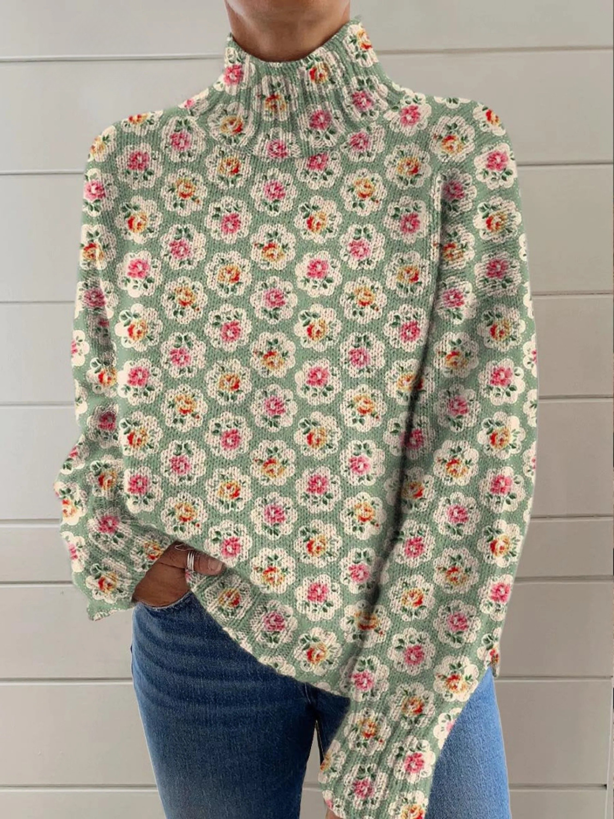 Multicolor floral turtleneck knit sweater with a relaxed fit and ribbed cuffs