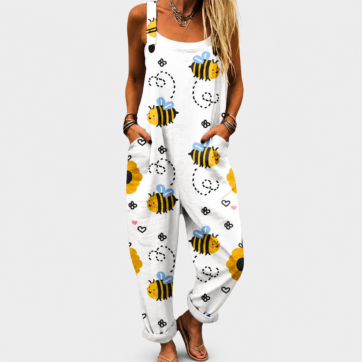 Printed wide-leg jumpsuit with adjustable straps and a relaxed, flattering fit
