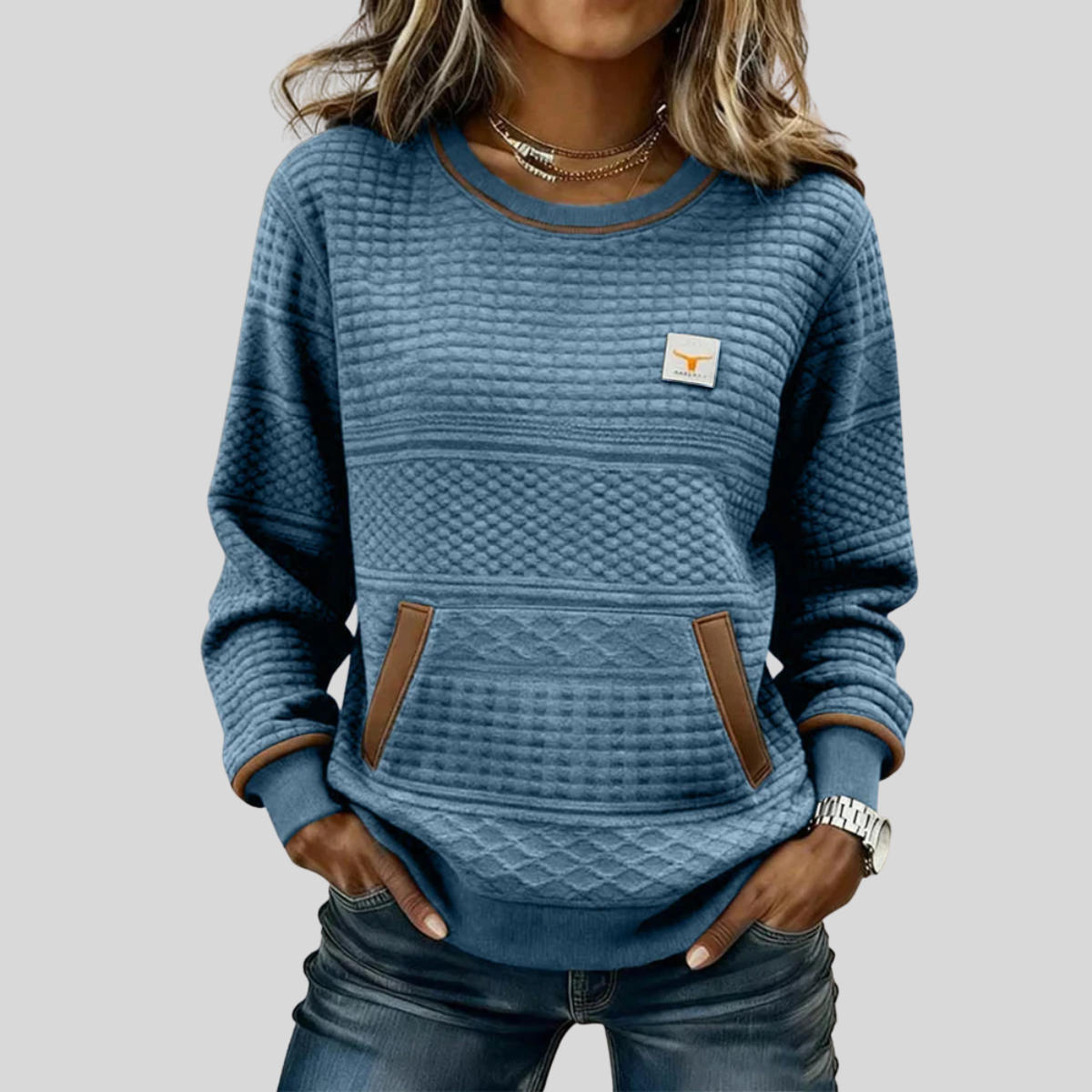Women's crew neck colorblock sweatshirt with quilted texture panels and front kangaroo pocket