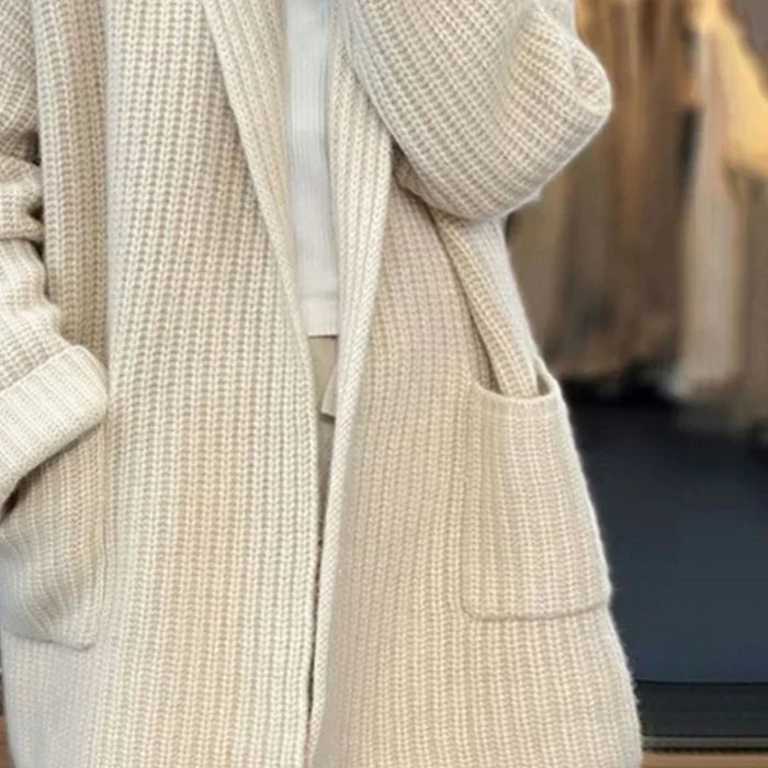 Women's open-front longline knit cardigan with shawl neckline and hip patch pockets in cream
