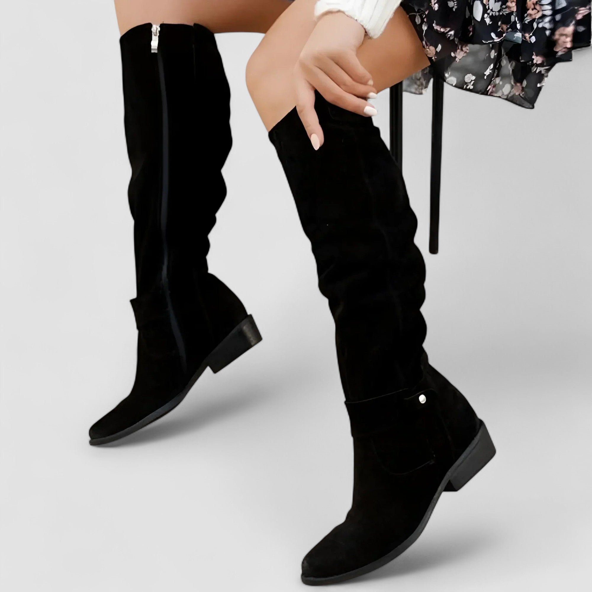 Slouch knee-high riding boots with ankle buckle strap and low block heel
