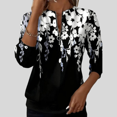 Black-and-white floral print quarter-zip sweatshirt with ring-pull zip and ribbed cuffs