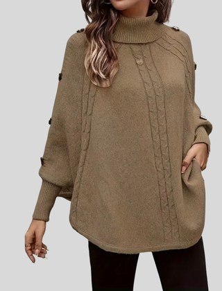 High-neck cable-knit sweater with ribbed turtleneck, shoulder buttons and relaxed oversized fit