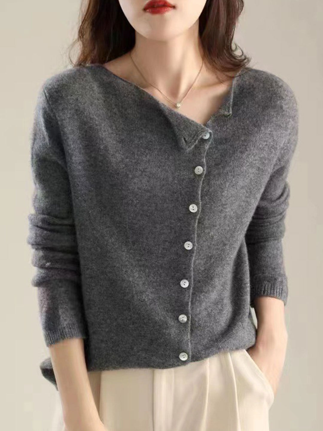 Women's V-neck button-front long sleeve cardigan with softly shaped collar and hip-length hem