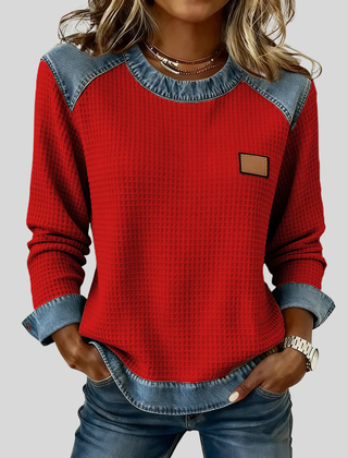Waffle-knit sweatshirt with denim-inspired trim and a small chest patch, shown in several colours
