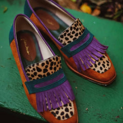 Brown animal print loafers with decorative fringes for women