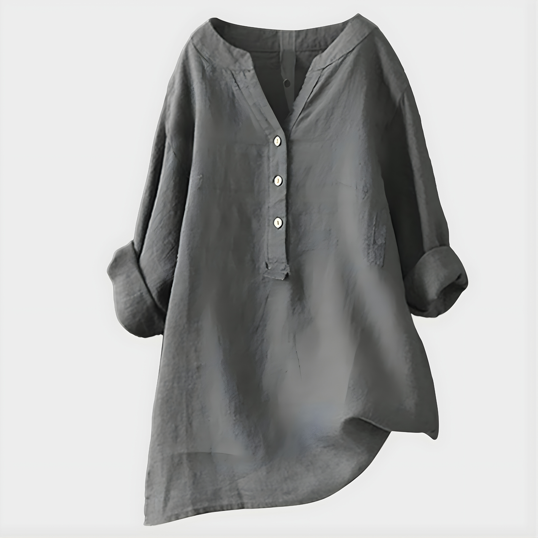 Woman wearing a relaxed cotton-linen V-neck blouse with soft draping