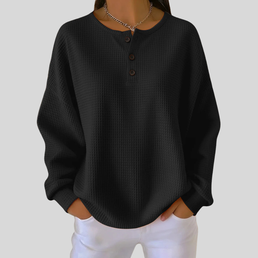 Relaxed-fit waffle-knit henley sweatshirt with button neckline, shown in several colours