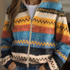 Multicolor zigzag striped knit cardigan with gold zip front, ribbed cuffs and cropped hem