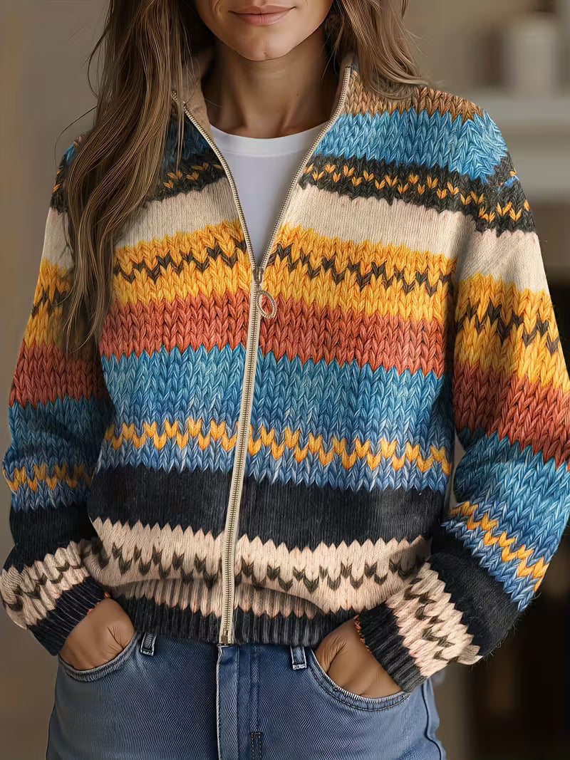 Multicolor zigzag striped knit cardigan with gold zip front, ribbed cuffs and cropped hem