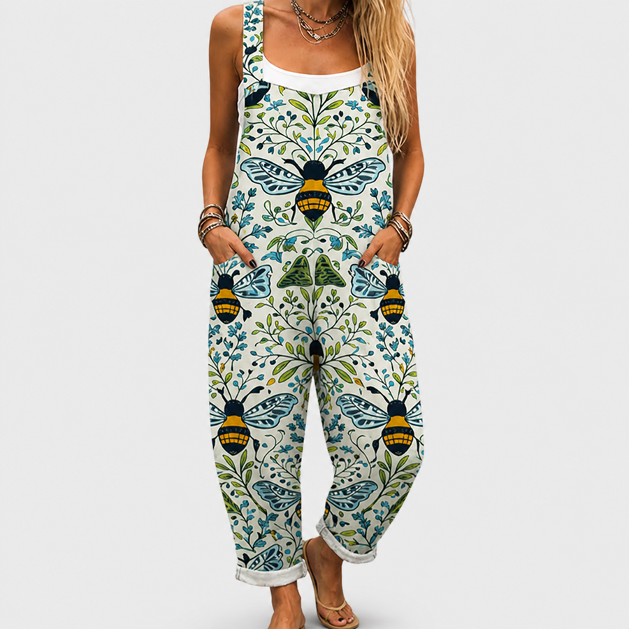 Woman wearing printed wide-leg overalls with adjustable straps