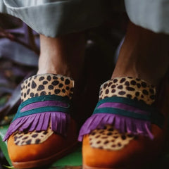 Brown animal print loafers with decorative fringes for women