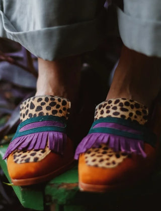 Brown animal print loafers with decorative fringes for women