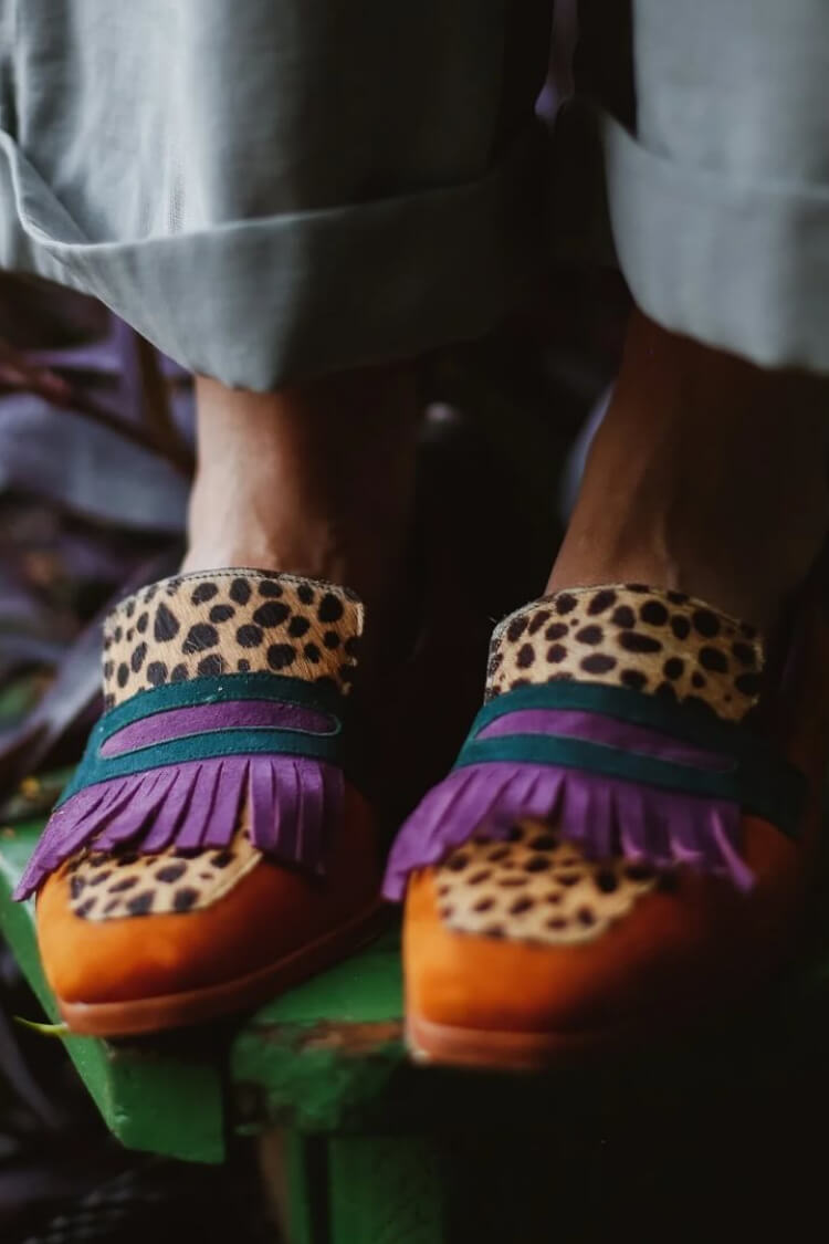 Brown animal print loafers with decorative fringes for women
