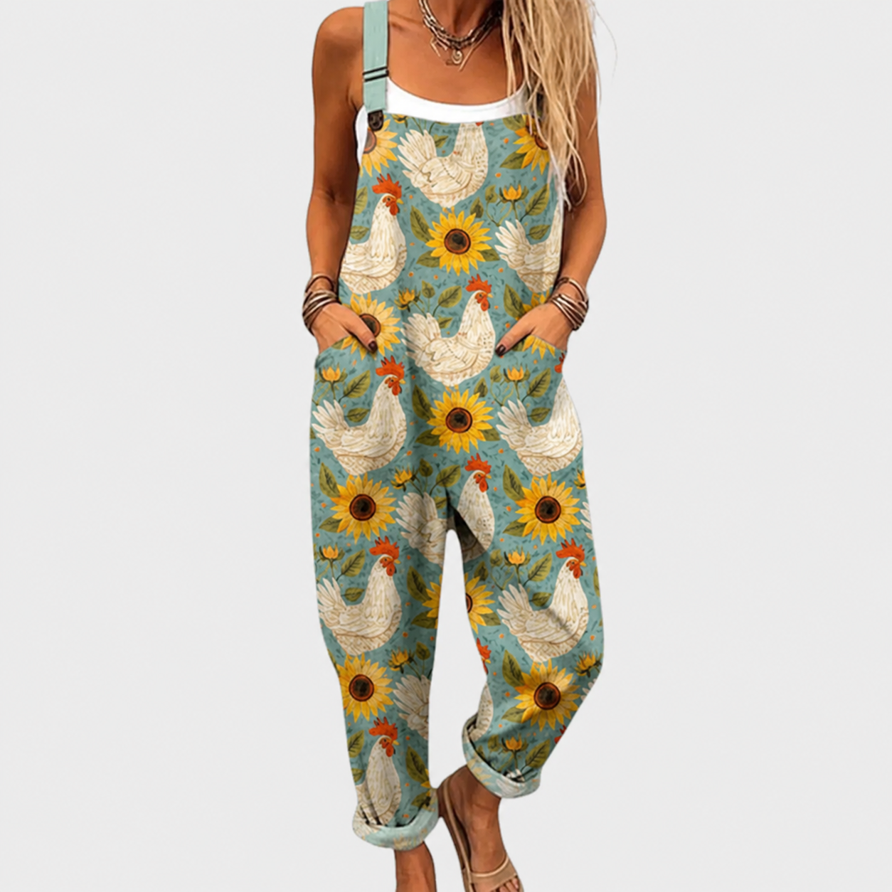 Woman wearing a printed wide-leg jumpsuit with adjustable straps