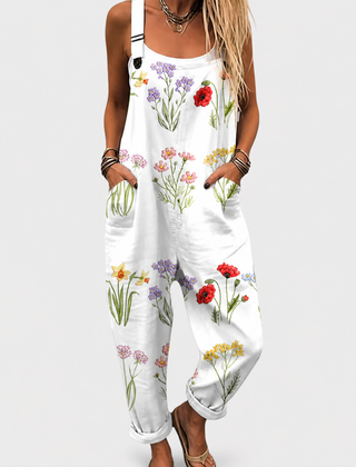 White printed wide-leg jumpsuit with adjustable straps and a relaxed, flattering fit