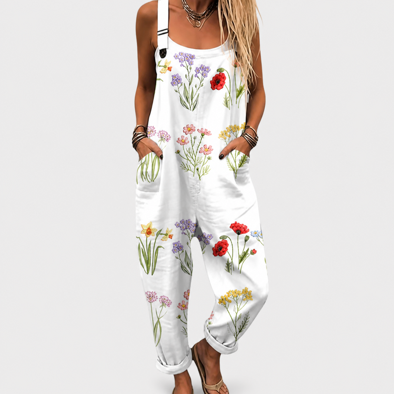 White printed wide-leg jumpsuit with adjustable straps and a relaxed, flattering fit