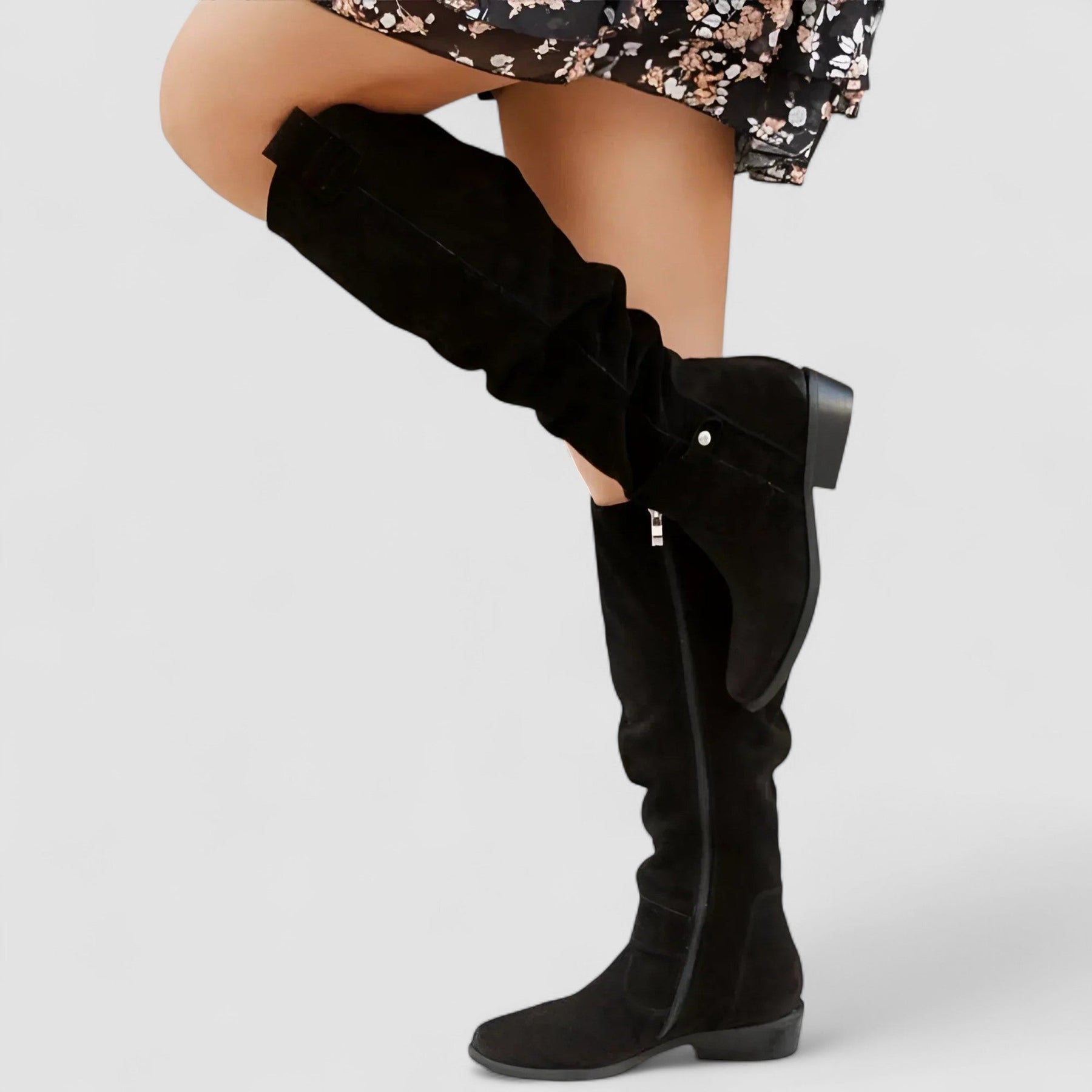 Slouch knee-high riding boots with ankle buckle strap and low block heel
