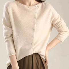 Women's V-neck button-front long sleeve cardigan with softly shaped collar and hip-length hem