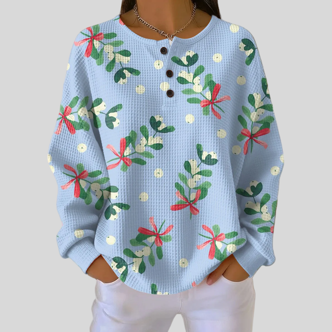Relaxed-fit waffle-knit sweatshirt with mistletoe print and button-placket neckline