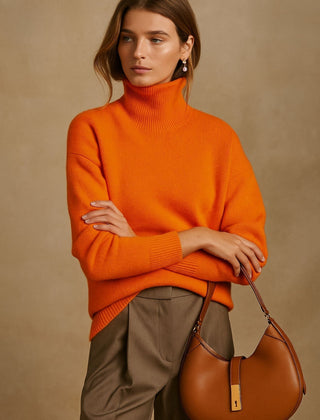 Women's high turtleneck sweater with relaxed fit, long sleeves and ribbed cuffs and hem