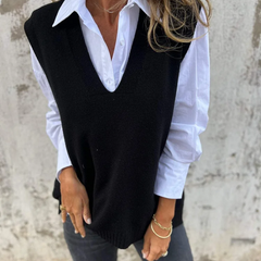 Sleeveless V-neck longline sweater vest with ribbed hem in a relaxed straight fit