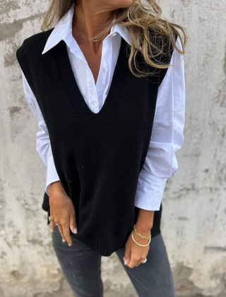 Sleeveless V-neck longline sweater vest with ribbed hem in a relaxed straight fit