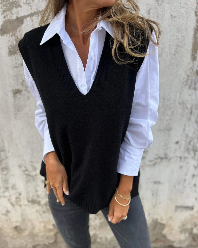Sleeveless V-neck longline sweater vest with ribbed hem in a relaxed straight fit