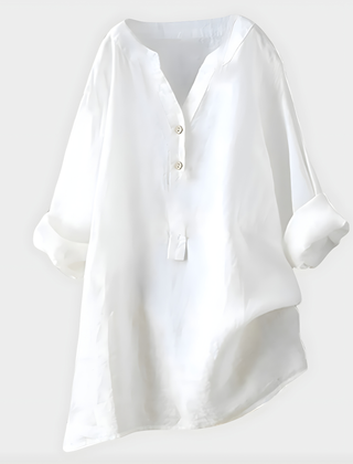 Woman wearing a relaxed cotton-linen V-neck blouse with soft draping