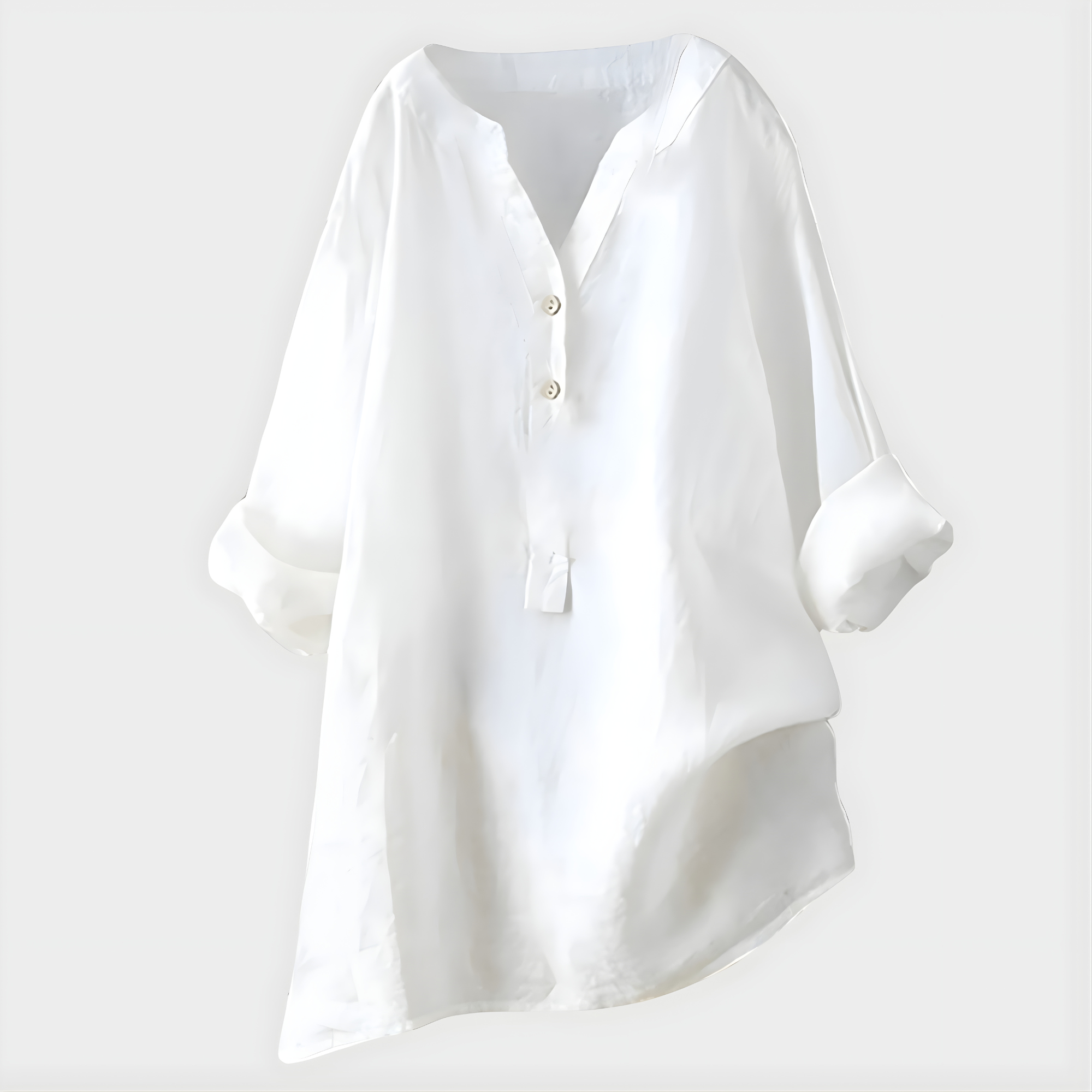 Woman wearing a relaxed cotton-linen V-neck blouse with soft draping