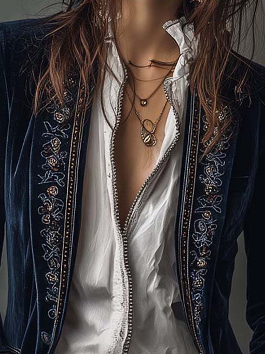 Women's vintage embroidered longline jacket with ornate lapel and cuff detailing