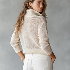 Woman wearing a loose-fit half-zip collar long-sleeve knit sweater