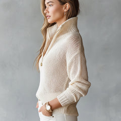 Woman wearing a loose-fit half-zip collar long-sleeve knit sweater