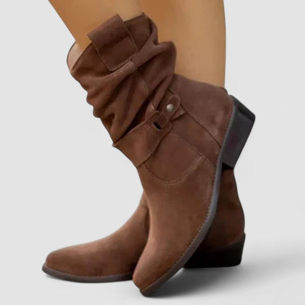 Slouch-style Western boots with low block heel, side zip and ankle buckle strap