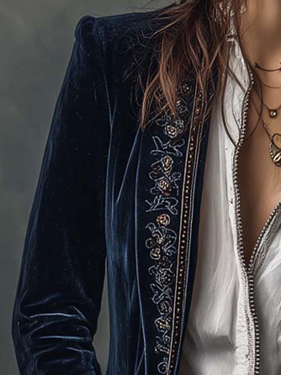 Women's vintage embroidered longline jacket with ornate lapel and cuff detailing