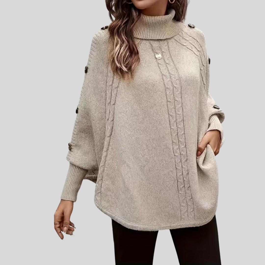 High-neck cable-knit sweater with ribbed turtleneck, shoulder buttons and relaxed oversized fit