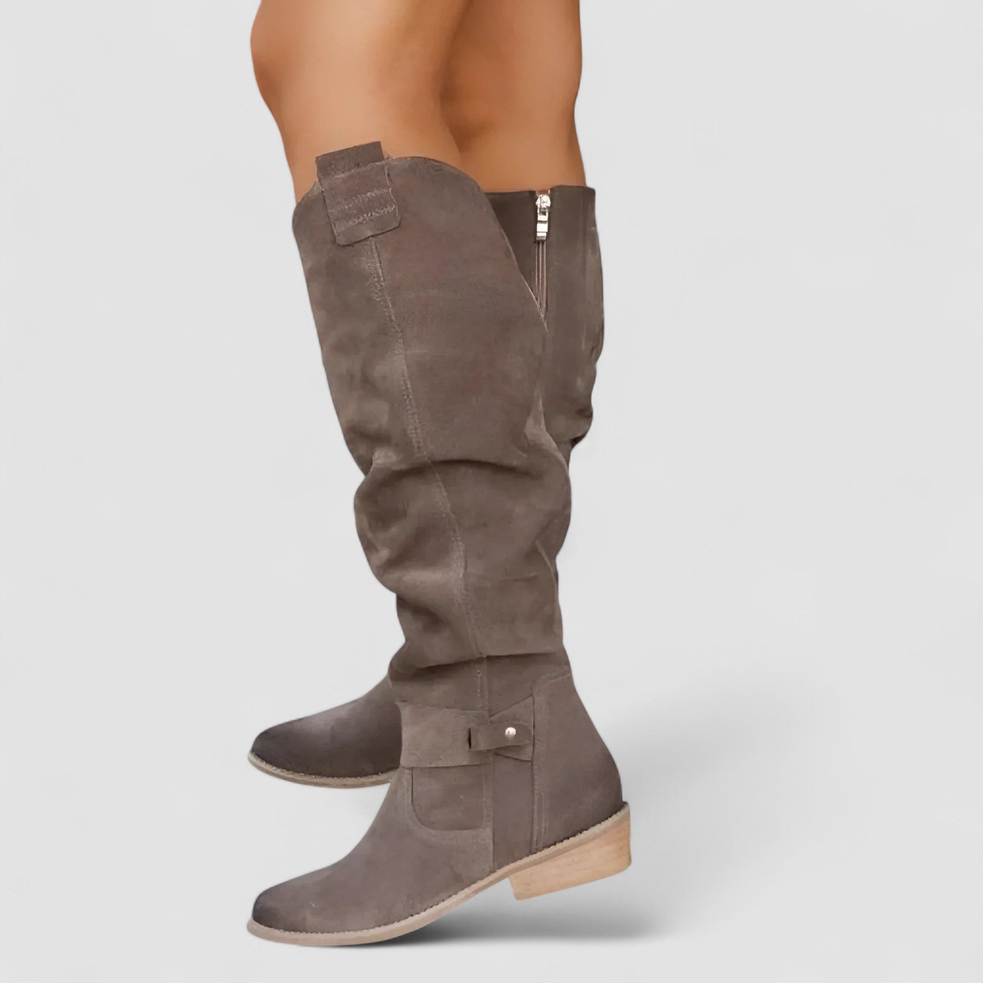 Slouch knee-high riding boots with ankle buckle strap and low block heel
