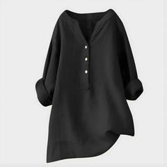 Woman wearing a relaxed cotton-linen V-neck blouse with soft draping
